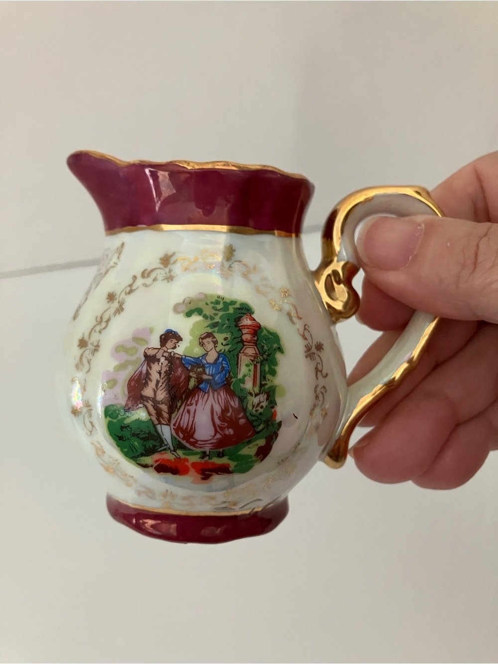 Ornate Porcelain Decorative Pitcher in Maroon and Gold